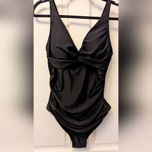 One piece slimming black bathing suit. Size L